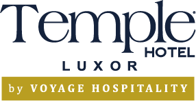 Temple Hotel Luxor logo with a gold banner reading 'by Voyage Hospitality'